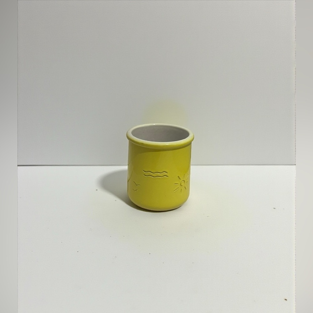 Ceramic yellow Cup With Carved in Designs